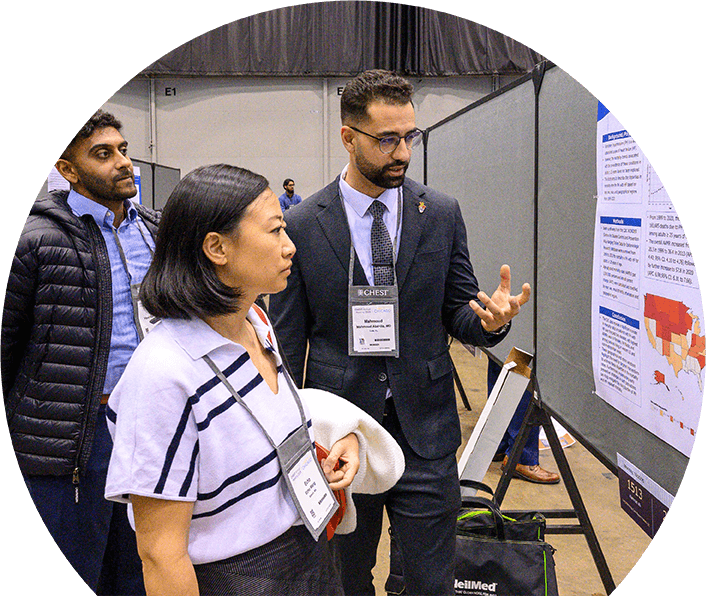 CHEST 2026 attendee presenting their research to other attendees