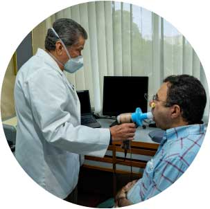 Man performing pulmonary function test in doctor's office