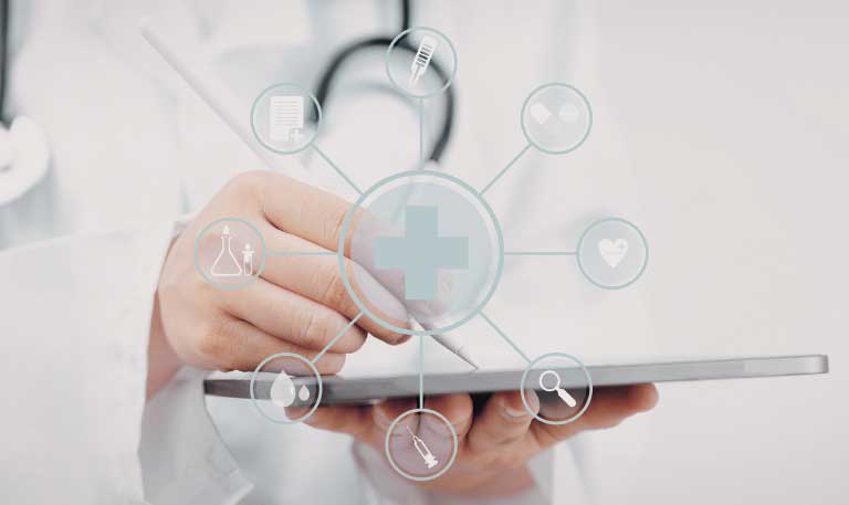 a person writing on a tablet with medical icons